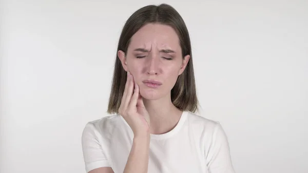 Dor de dente, jovem mulher com dor de dente no fundo branco — Fotografia de Stock