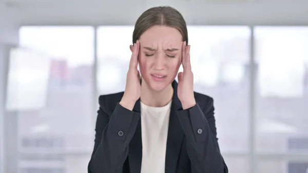 Portrait of Tired Young Businesswoman having Headache — Stok Foto