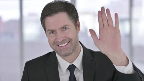 Portrait of Cheerful Middle Aged Businessman doing Video Chat — Stock Photo, Image