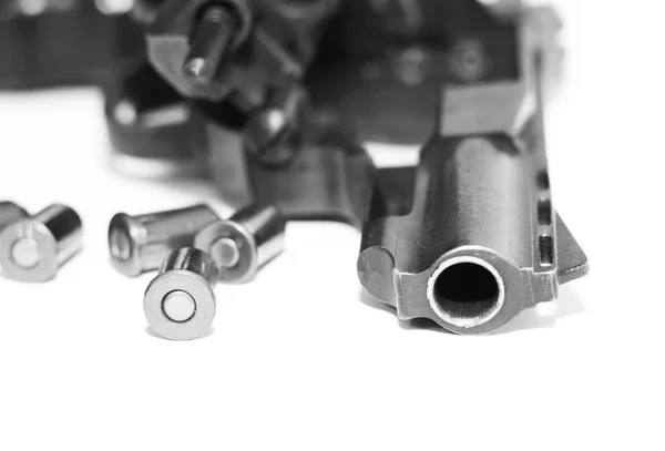 Revolver with bullets close-up isolated on white background / black and white photo — Stock Photo, Image