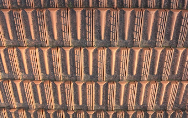 Vintage background from old clay tiles for the roof close-up — Stock Photo, Image