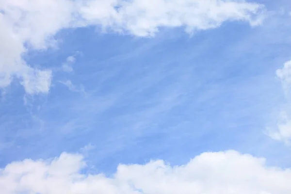 Blue sky background with white clouds closeup — Stock Photo, Image