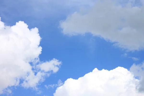 Blue sky background with white clouds closeup — Stock Photo, Image