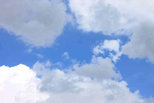 Blue sky background with white clouds closeup — Stock Photo, Image