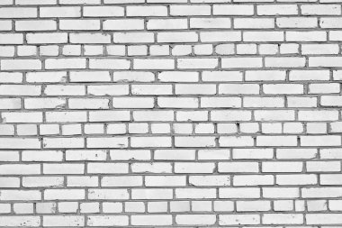 Tuğla duvarın beyaz silikat tuğla yapısı ve çimento inşaat eklemleri ile siyah beyaz arkaplan