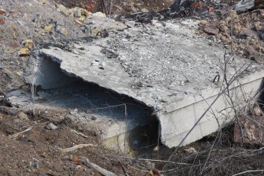 Construction waste with elements of and destroyed old structures at municipal landfill
