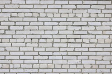 Beyaz binanın gri arka planı silikat tuğla