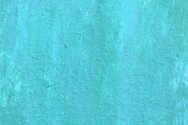 Pürüzlü bir yüzeyi olan eski mavi boyalı, eski ve pürüzlü bir yüzey üzerindeki mavi rengin çizgileri ve pürüzlü dokusuyla güzel bir klasik arka plan.