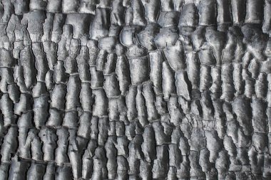 Yanmış ahşap desenli siyah arkaplan