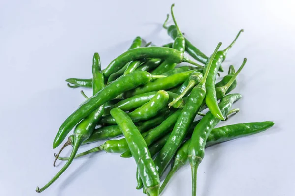 Sri Lankan green chillies isolated on white background