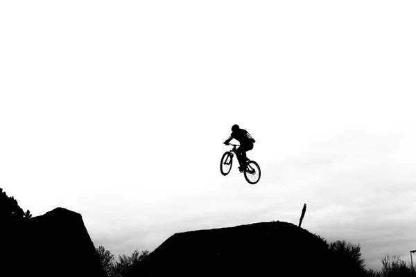 Bike high in the air — Stock Photo, Image