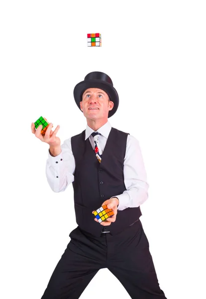 Artist juggles with cubes — Stock Photo, Image