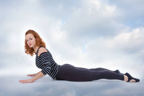 woman in yoga cobra posture