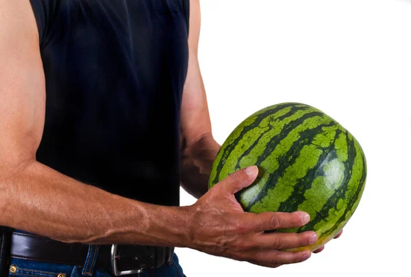 Homem detém melancia na mão — Fotografia de Stock