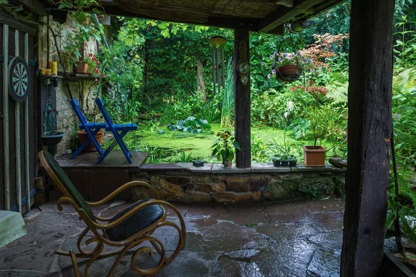 Armchair with view to pond — Stock Photo, Image