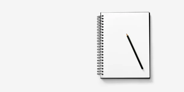Open notebook on white background with a pencil — Stock Photo, Image