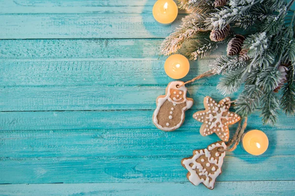 Ginger cookies in the form of Christmas toys on dark blue background — Stock Photo, Image