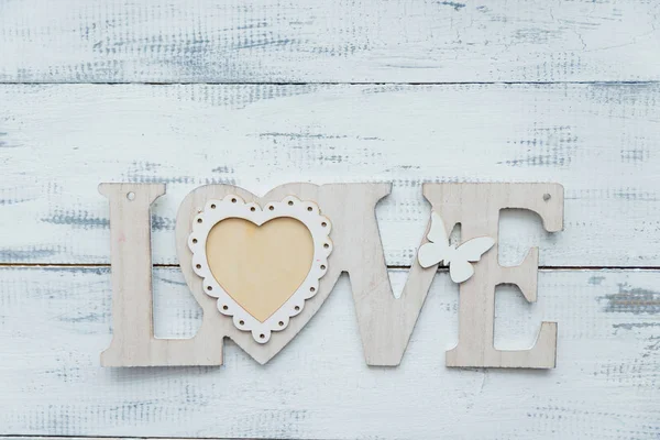 white love letter on white wooden background