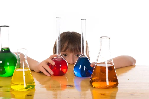 School girl doing chemistry science experiment — Stock Photo, Image