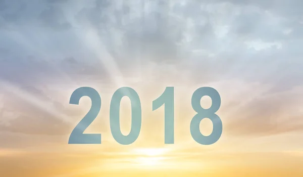 Ano Novo 2018 dígitos texto pôr do sol desfoque fundo — Fotografia de Stock