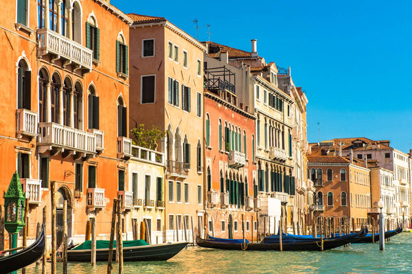 Venice Grand Canal with colorful facades of old medieval houses , Italy