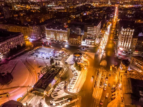 Aerial winter city view with roads, houses, buildings. Helicopter drone shot — Stock Photo, Image