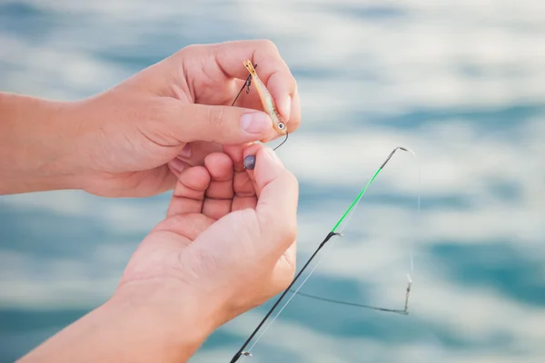 Montando el cebo de silicona. Pesca marítima. Jigging. . —  Fotos de Stock