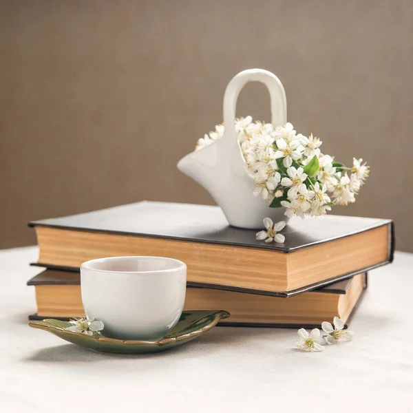 Little Vase Formed White Ceramic Basket Cherry Tree Flowers Book — Stock Photo, Image