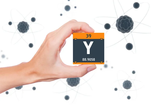 Yttrium Element Symbol Handheld Atoms Floating Background — Stock Photo, Image