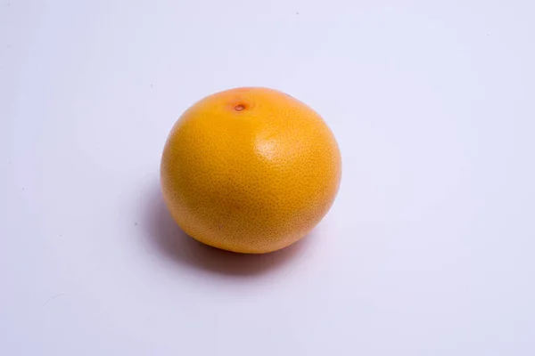 Whole grapefruit isolated on white — Stock Photo, Image