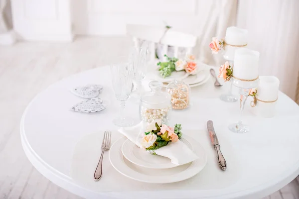 Dining table setting at Provence style, with candles, lavender, vintage crockery and cutlery, closeup. — Stock Photo, Image