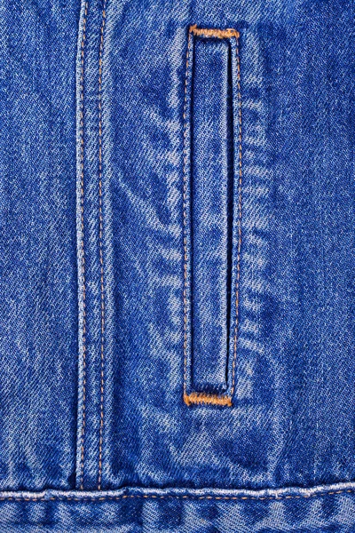 Pocket of jeans jacket close-up