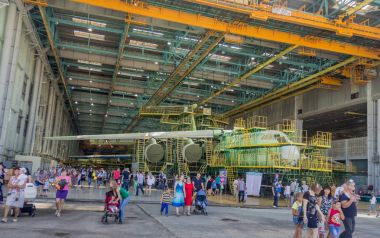 ULYANOVSK, RUSSIA. 19.08.2017. Holiday - AIR FLEET DAY / DAY OF CIVIL AVIATION / DAY OF THE AIRFLOW / DAY OF THE AIRCRAFT. NEW ILYUSHIN IL-76MD-90A / IL-78M-90A AT FINAL ASSEMBLY LINE, ASSEMBLY SHOP,  clipart
