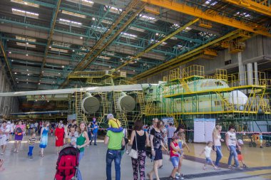 ULYANOVSK, RUSSIA. 19.08.2017. Holiday - AIR FLEET DAY / DAY OF CIVIL AVIATION / DAY OF THE AIRFLOW / DAY OF THE AIRCRAFT. NEW ILYUSHIN IL-76MD-90A / IL-78M-90A AT FINAL ASSEMBLY LINE, ASSEMBLY SHOP,  clipart