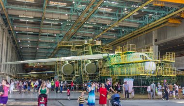 ULYANOVSK, RUSSIA. 19.08.2017. Holiday - AIR FLEET DAY / DAY OF CIVIL AVIATION / DAY OF THE AIRFLOW / DAY OF THE AIRCRAFT. NEW ILYUSHIN IL-76MD-90A / IL-78M-90A AT FINAL ASSEMBLY LINE, ASSEMBLY SHOP,  clipart