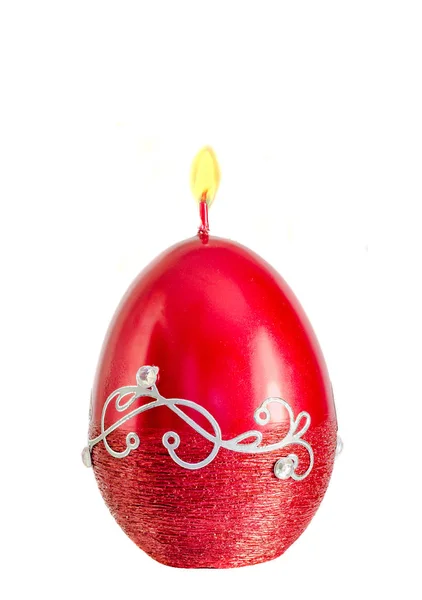 Forma de huevo, vela ovalada de Pascua, llama, aislada, de cerca, blanca —  Fotos de Stock