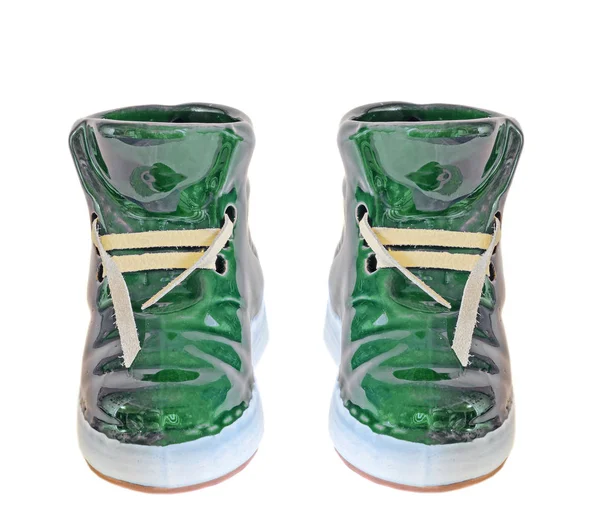 Zelený keramický boty, tenisky, Detailní záběr, izolovanou, bílé pozadí — Stock fotografie
