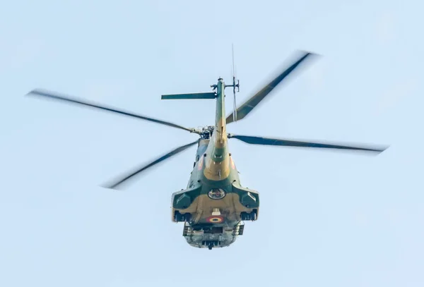 The Aviation Day near Aviators Statue. Helicopter in the air. — Stock Photo, Image