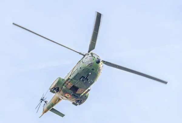 Aerobatic elicopter pilots training in the sky of the city. Puma elicopter, navy, army drill. — Stock Photo, Image