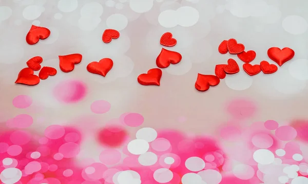 Textiel rode harten Valentines Day hart, roze bokeh achtergrond — Stockfoto