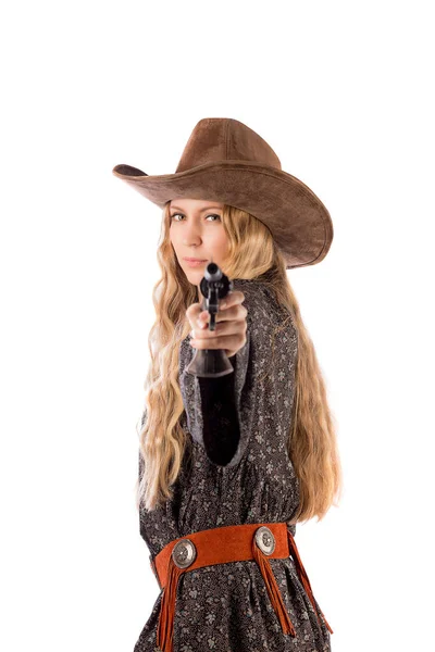 Lány cowboy kalapban és pisztollyal. — Stock Fotó