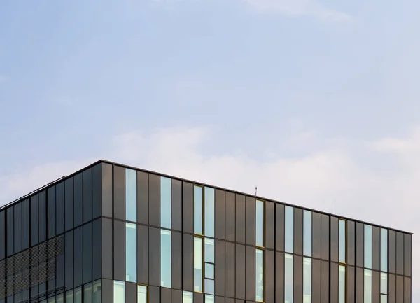 Windows of a modern high-tech building close-up, like a background