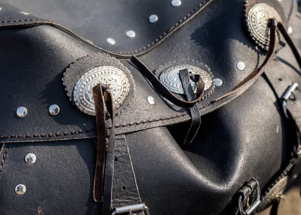 leather biker bag on a motorcycle close-up