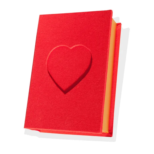 Caixa vermelha forma de livro com um coração isolado — Fotografia de Stock