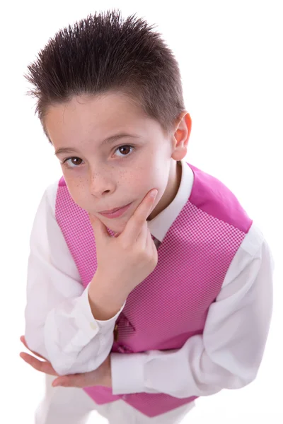 Joven niño sosteniendo su barbilla en su Primera Comunión mirando f — Foto de Stock