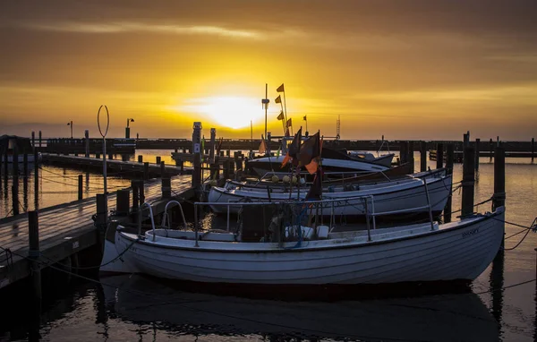 Sunset at the old harbor. — Stock Photo, Image