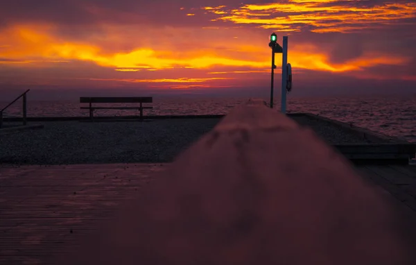 Sunset at the old harbor. — Stock Photo, Image