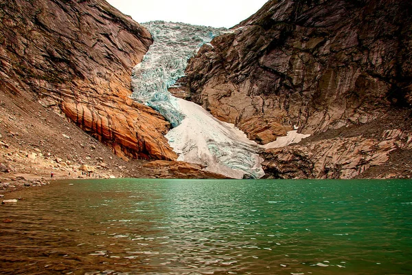 Briksdal glacier at the foot — Stock Photo, Image