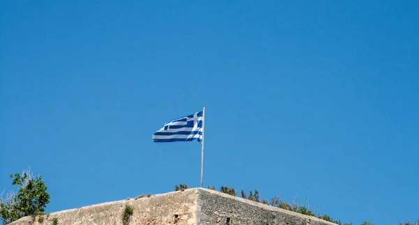 Bandera griega en el castillo de Rethymno, Creta, Grecia —  Fotos de Stock