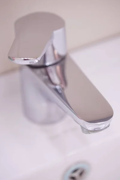 Chrome water tap. Faucet closeup. Macro photo. — Stock Photo, Image